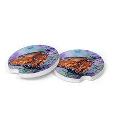 Load image into Gallery viewer, Handmade ceramic car coaster featuring a vibrant butterfly design"