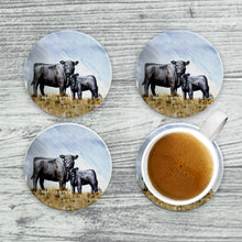 Load image into Gallery viewer, Angus cow with calf on an absorbent ceramic coaster, showcasing a heartwarming farm animal scene.