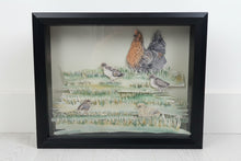Load image into Gallery viewer, Farmhouse decor that is created in Oklahoma USA. Handmade watercolor artwork featuring a hen and five fluffy chicks in grassy fields, created as an 8x10 layered paper painting.