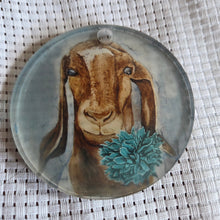 Load image into Gallery viewer, Round translucent decorative ornament featuring a bold goat design on a textured white background.
