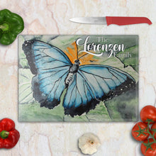 Load image into Gallery viewer, Tempered glass cutting board with a delicate watercolor butterfly in soft pastel tones – elegant farmhouse kitchen accent.
