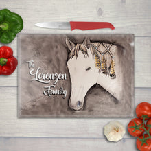 Load image into Gallery viewer, Watercolor design of a strong, stylish horse with feathers in his hair, printed on tempered glass – bold western charm for farmhouse kitchens
