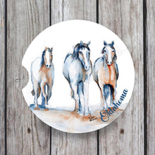 Load image into Gallery viewer, Lorenzen Running Horse Watercolor Car Coaster, handmade absorbent ceramic design that keeps cup holders dry. Ideal for horse lovers and unique vehicle accessories
