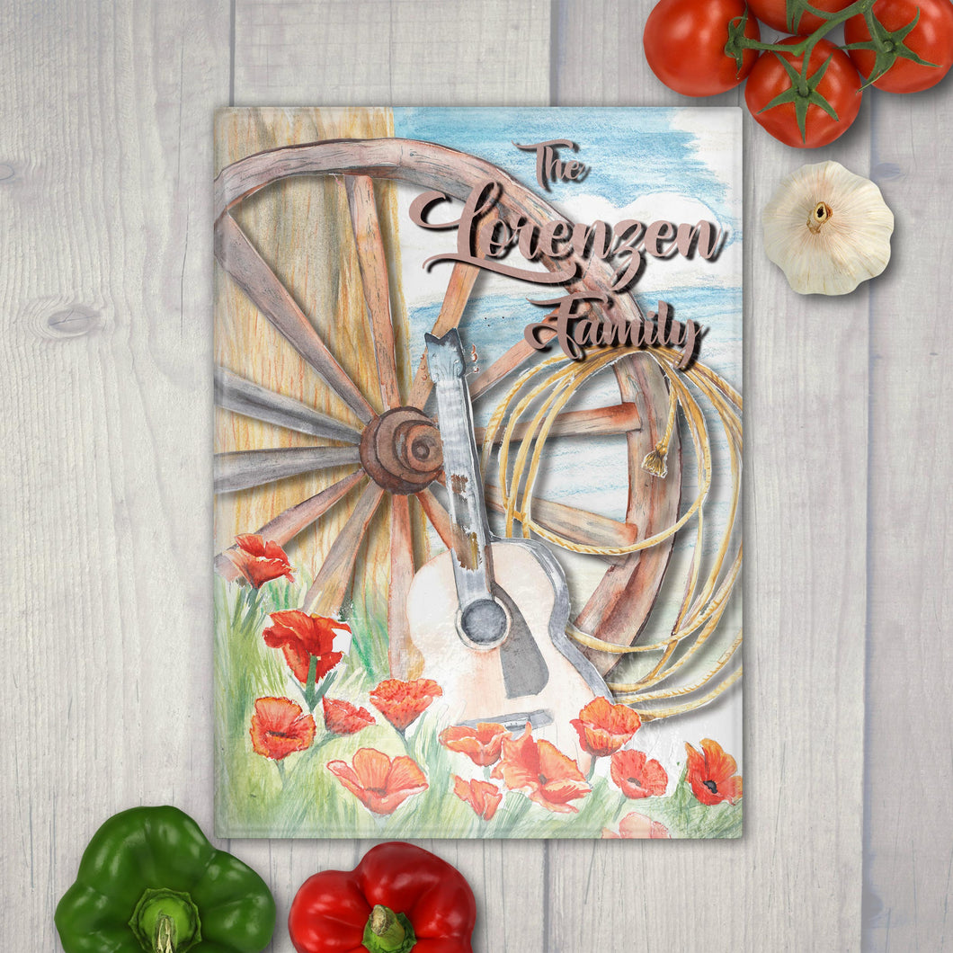 Tempered glass cutting board featuring a watercolor illustration of a wagon wheel, poppies and guitar– rustic farmhouse kitchen decor with western flair